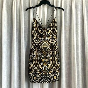 Free people black gold size 0 dress never worn